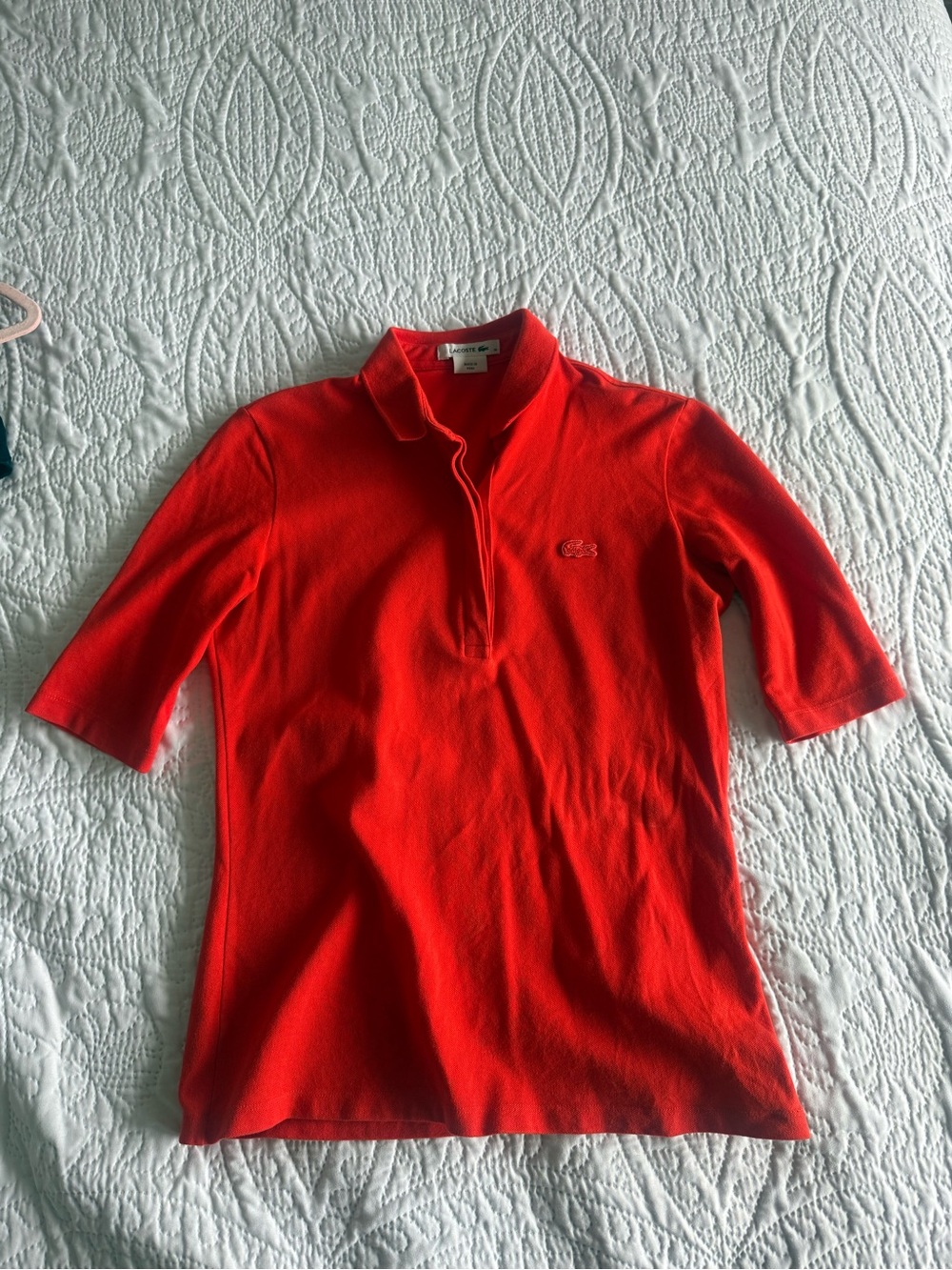 Lacoste Red Women's Clothing Polo Shirt
- Slim Fit 3/4 Sleeve